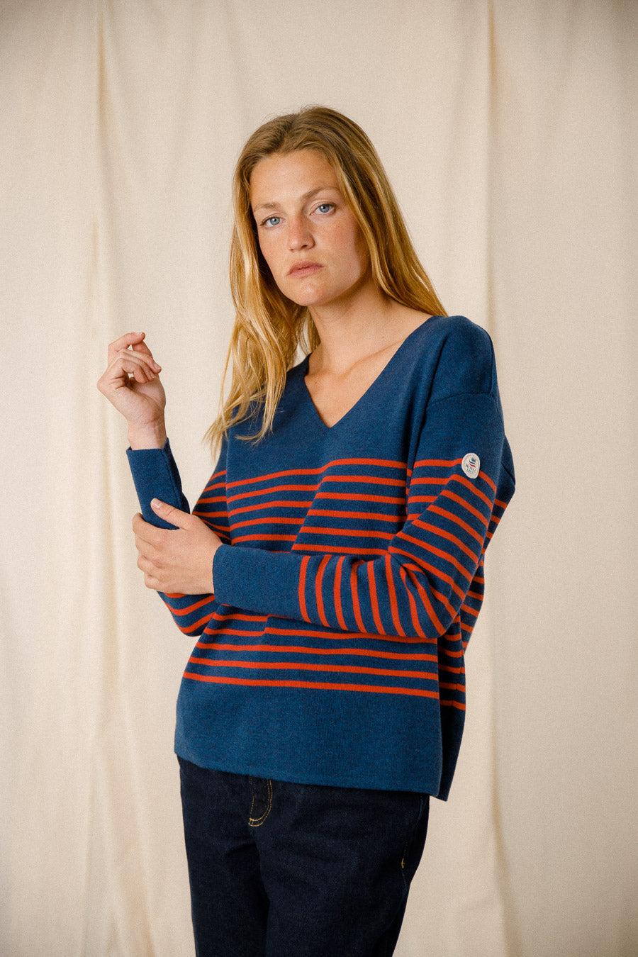 Pull rayé col v