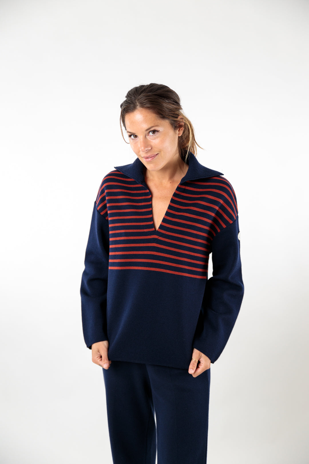 Two-tone striped sweater with peacock collar