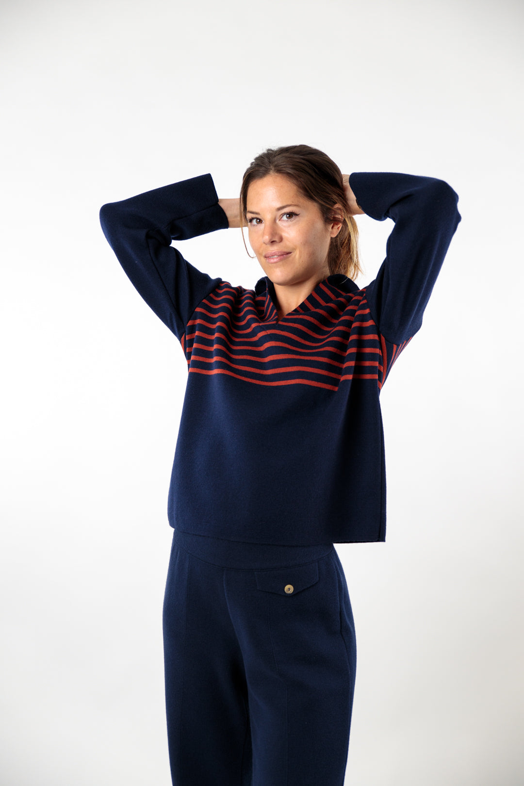 Two-tone striped sweater with peacock collar