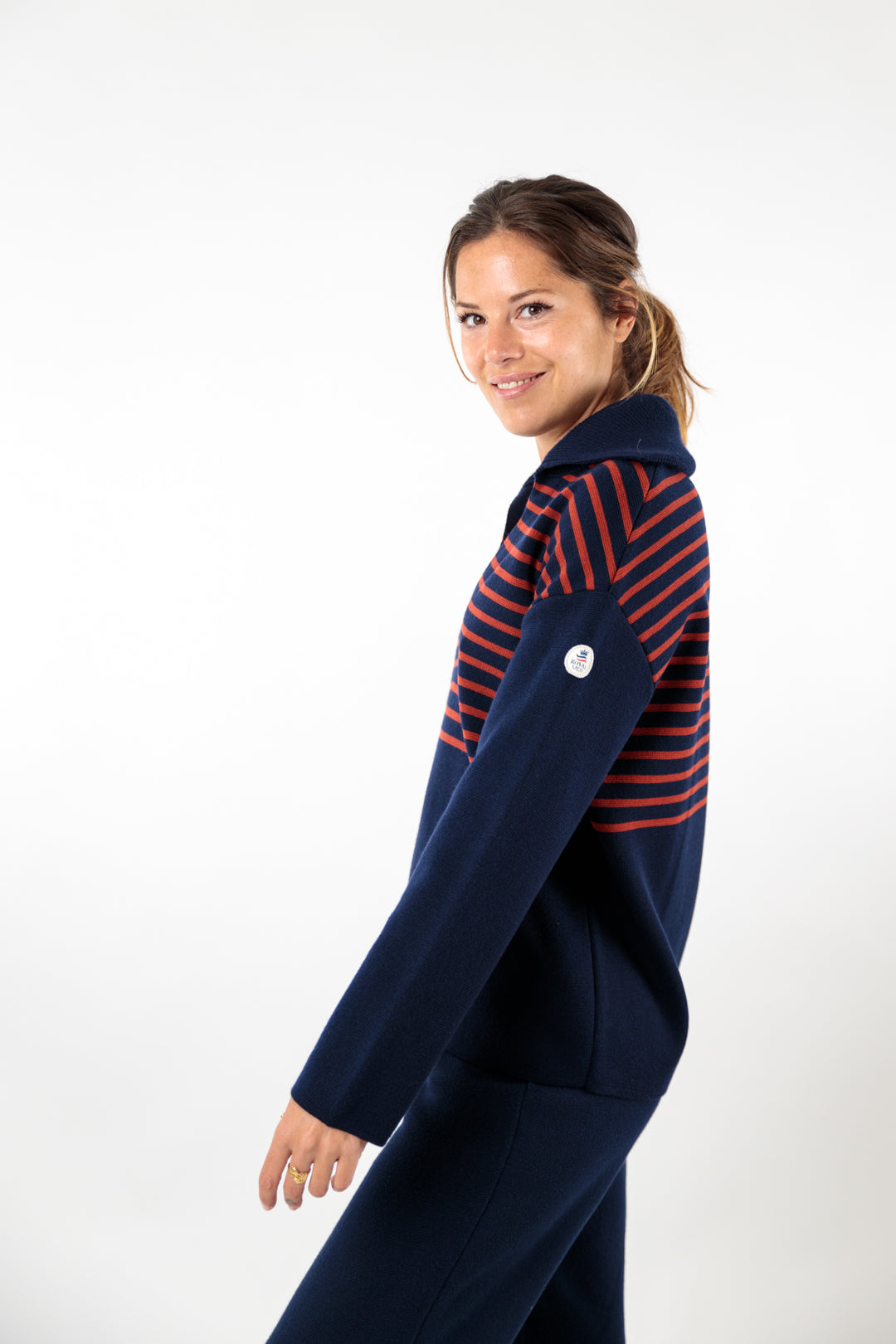 Two-tone striped sweater with peacock collar