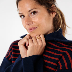 Two-tone striped sweater with peacock collar