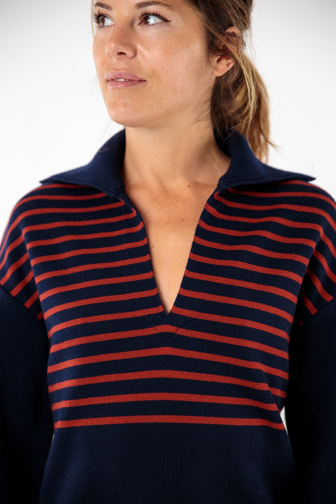 Two-tone striped sweater with peacock collar