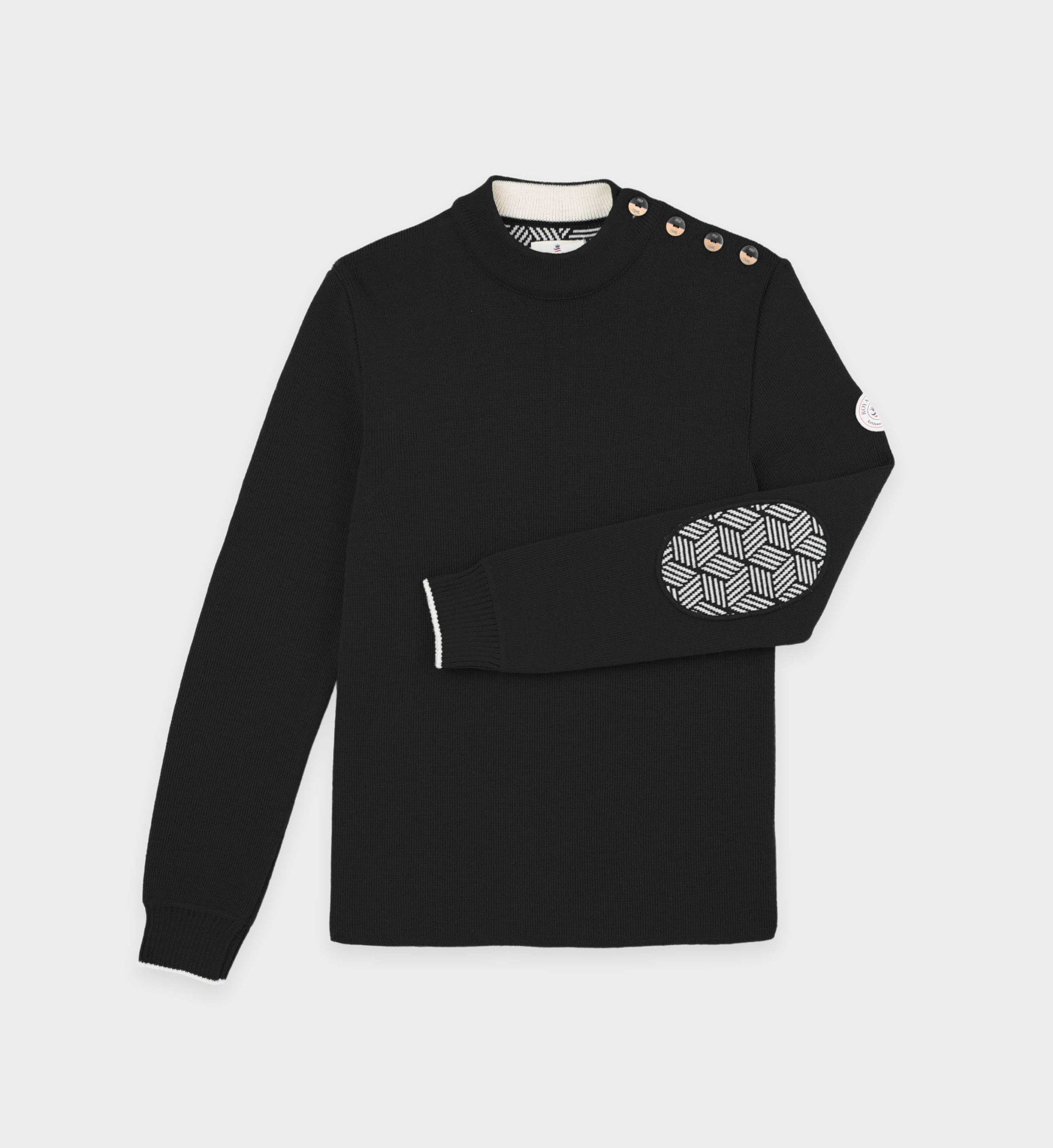 Pull marin uni coudières fantaisies
