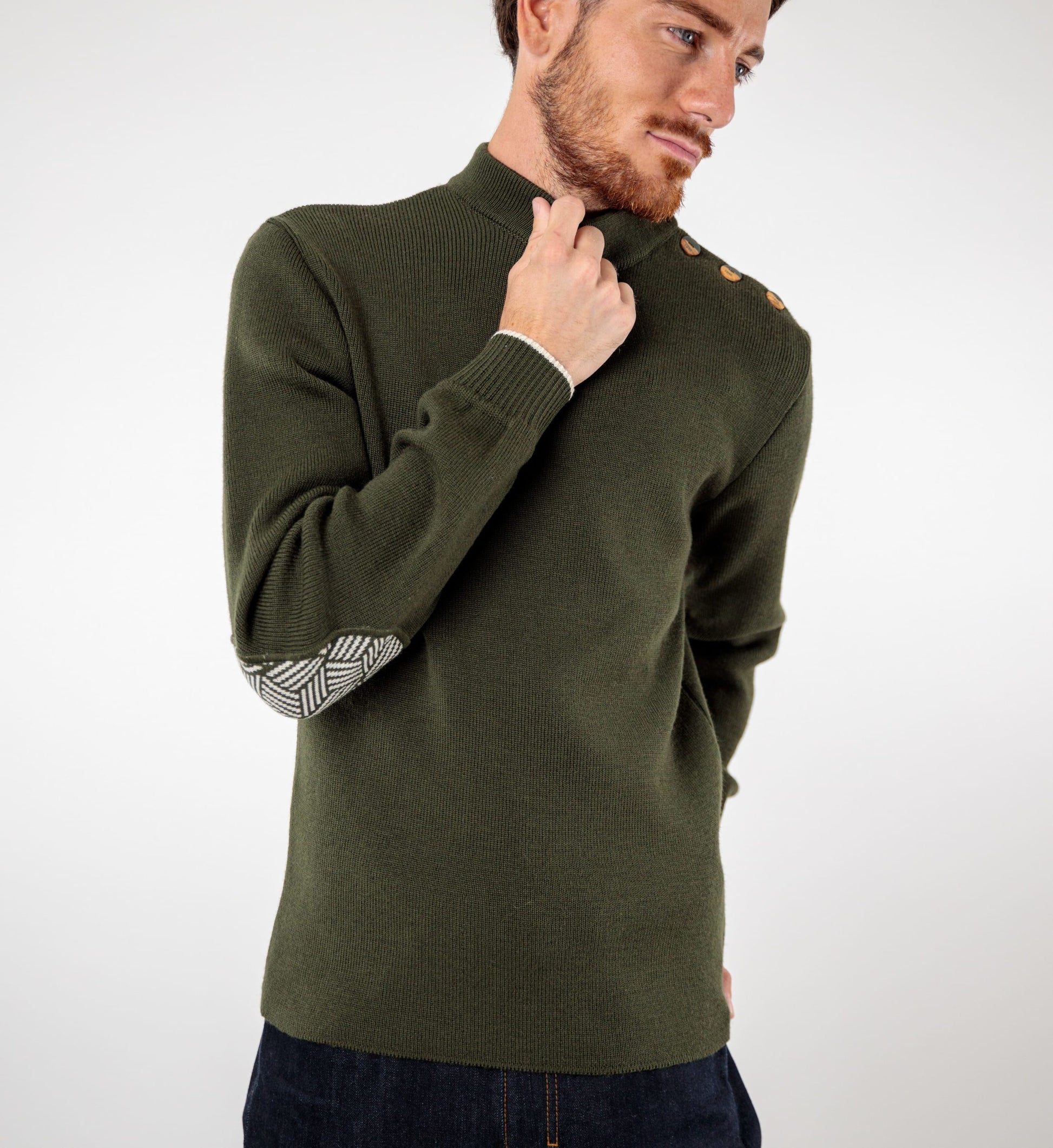 Pull marin uni coudières fantaisies