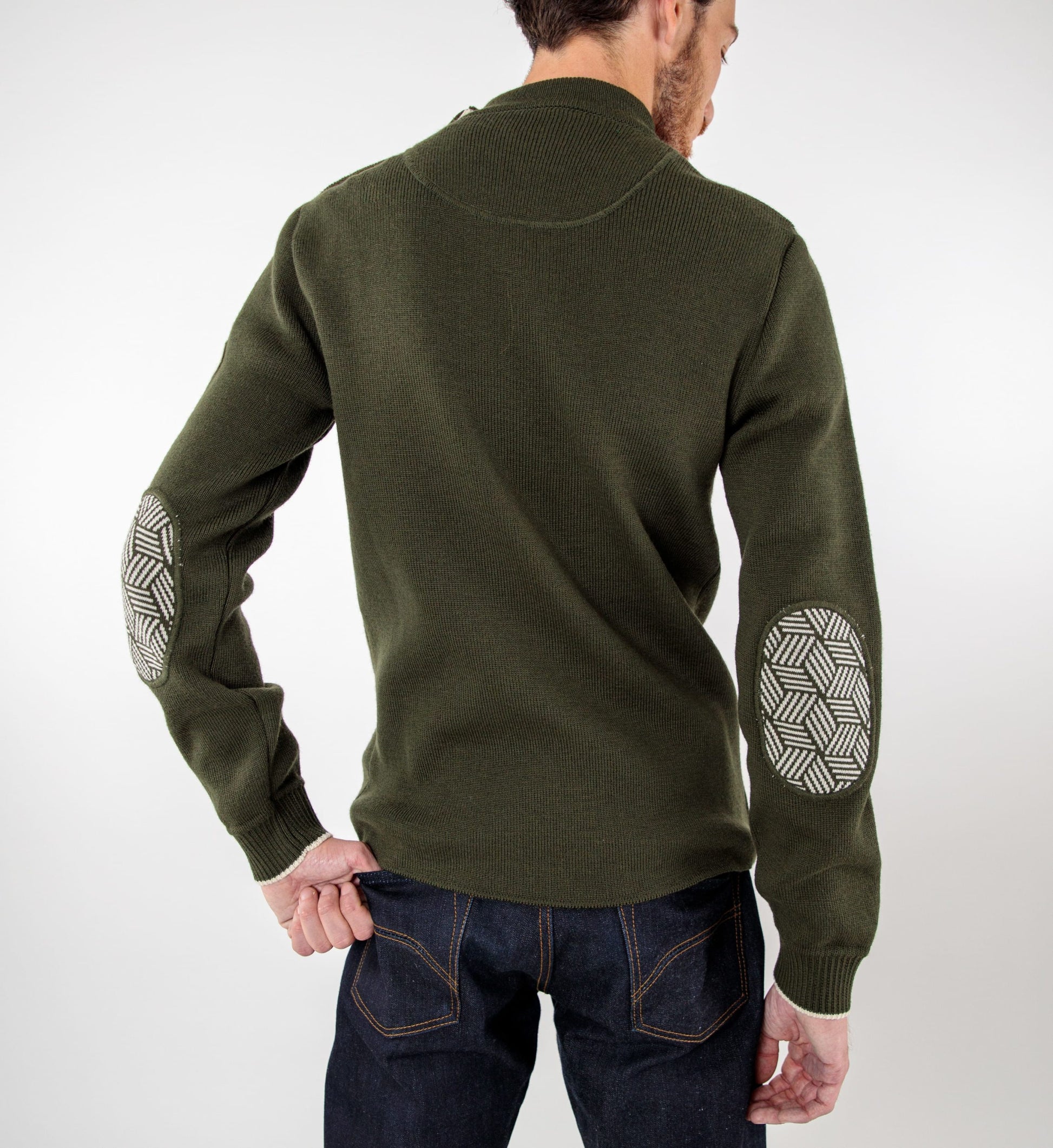 Pull marin uni coudières fantaisies