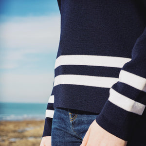 Striped sailor sweater placed at the bottom of the body