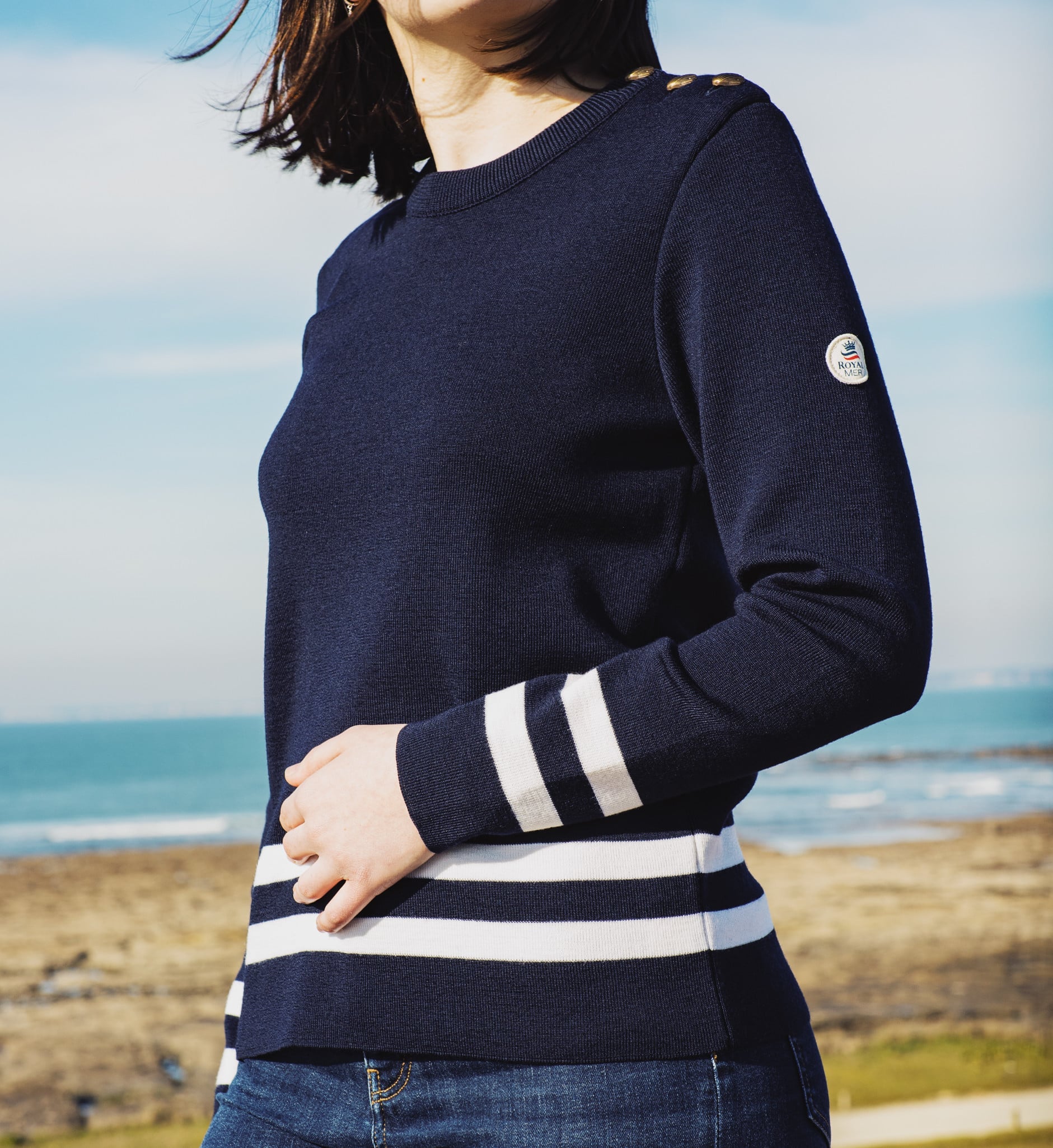 Striped sailor sweater placed at the bottom of the body