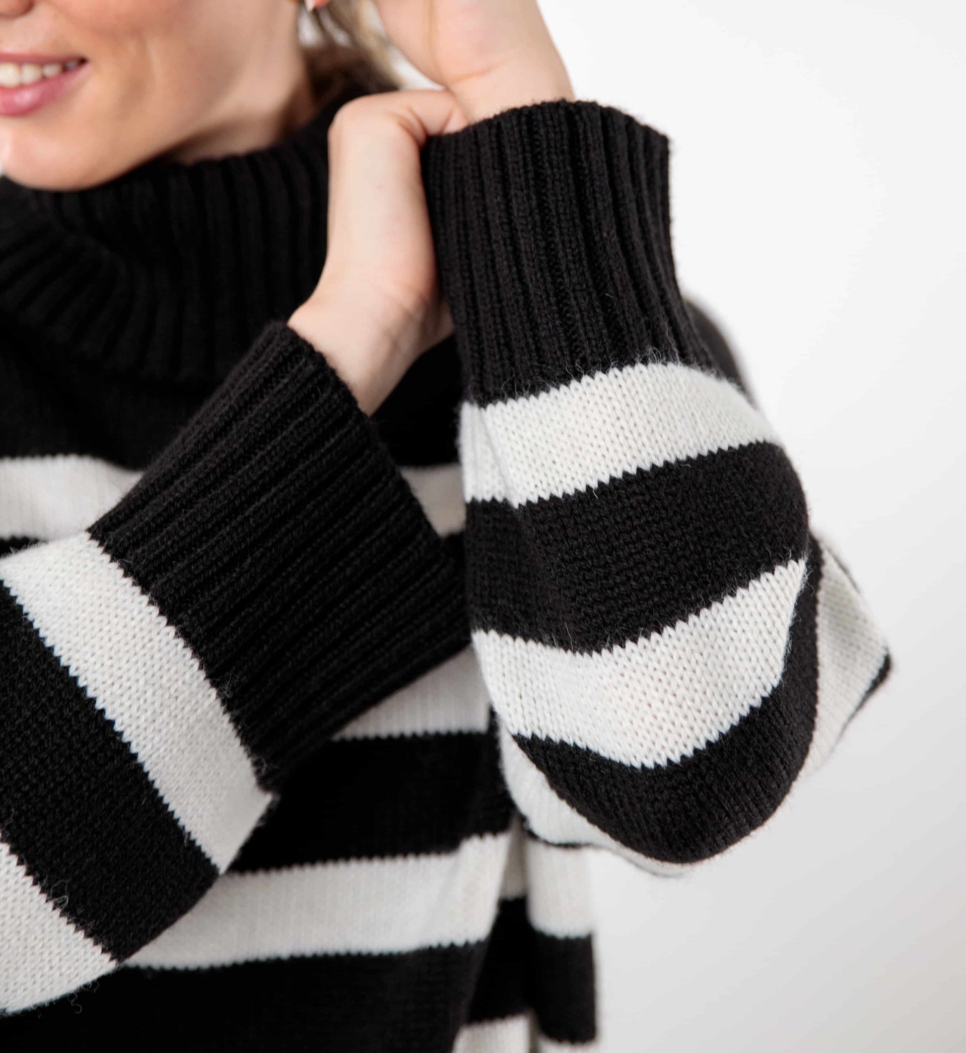 Loose striped turtleneck sweater